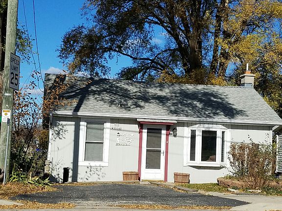 Front elevation with drive.