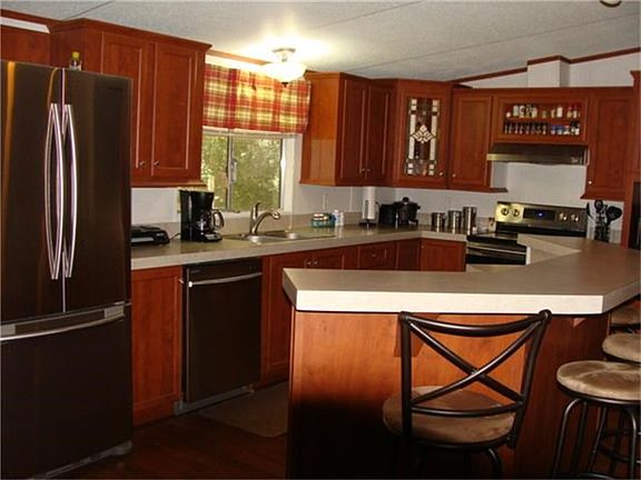 SS appliances  & bar-stools stays with sale of home.