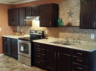 711 W 3rd St, Spur, TX 79370