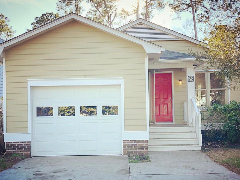 Front of house. 1 car garage and two outside parking spaces.