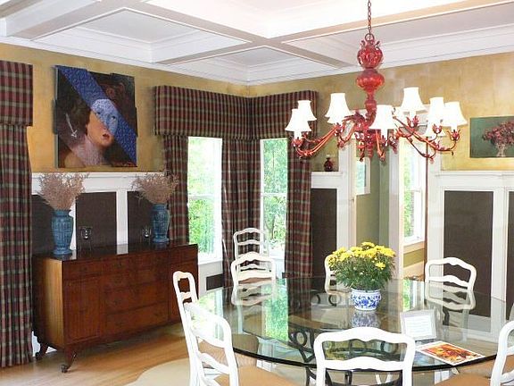 Dining area with silver leaf and wainscoating