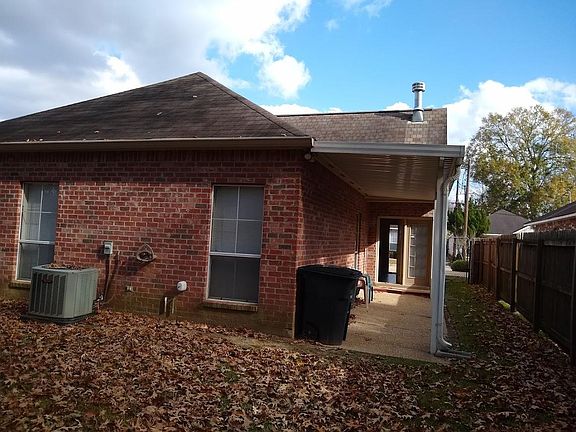 Attached patio and spacious backyard
