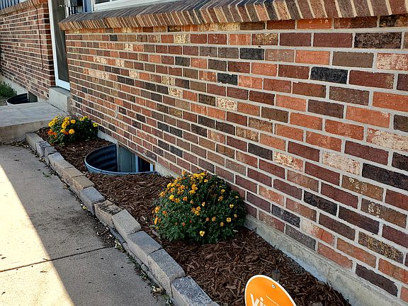 Front flower bed; Vivint security