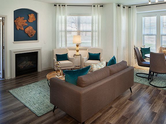 Luxury vinyl plank flooring through the entry, kitchen and select living and dining spaces