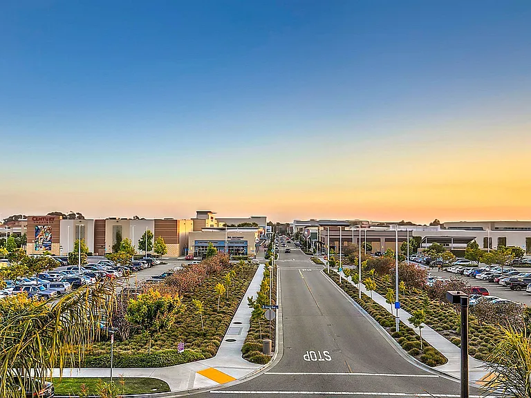 Bustling shopping center with ample parking near Tempo at Riverpark