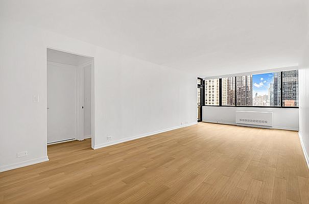 1st image of 124 W 60th St APT 19A