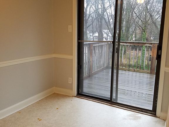 Eat in kitchen with view to balcony deck.
