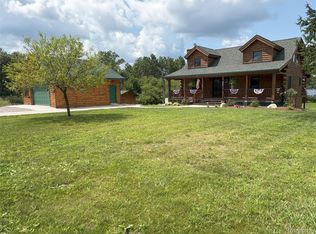 103 Arbutus Dr, Cadillac, MI 49601