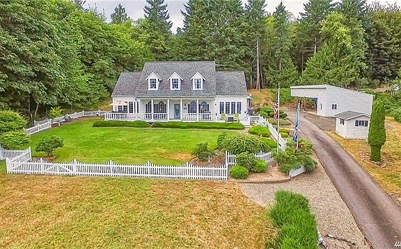 Welcome to your Custom Colonial Home with cedar siding. Located just 5 minutes from amenities and 45 minutes to the Bremerton Ferry Dock.  What a great full time home or a weekend getaway! There are sweeping views of Oakland Bay from most every room in the home. Very much your own castle on a hillside!