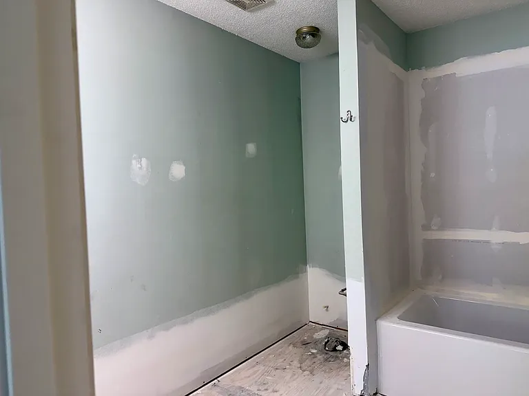 Master bathroom has a new tub, and will have tile walls, new floors, new cabinet, toilet and paint.