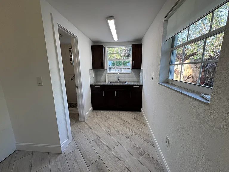 Kitchen area towards right of entrance