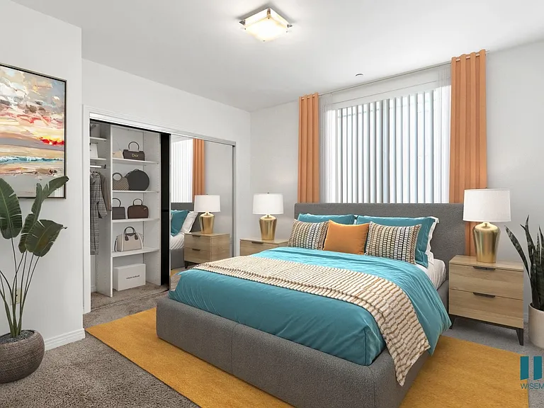 Bedroom with Mirrored Closet with Shelving and Large Windows