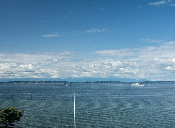 Expansive and unobstructed Sound, Olympic Mountain & City views.