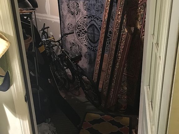 Storage space off kitchen. Has door to provide street access