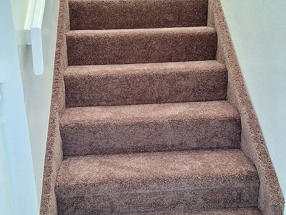 Stairs to 2nd floor. 2 bedrooms and full bath