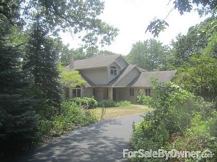 Driveway entrance.
						:
						Recently renewed blacktop to driveway.