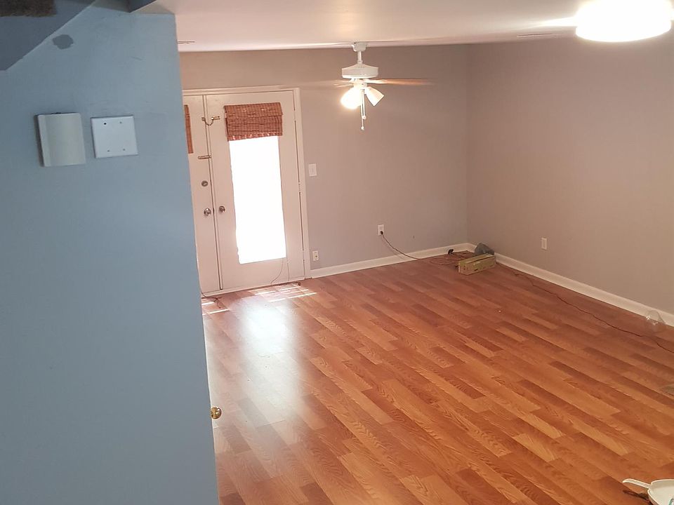 living room which leads up to patio