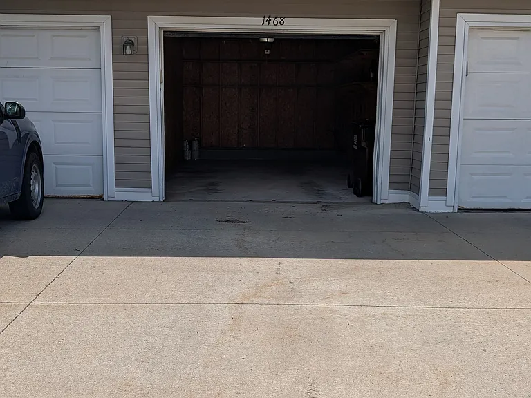 Detached garage and additional parking spot out front.
