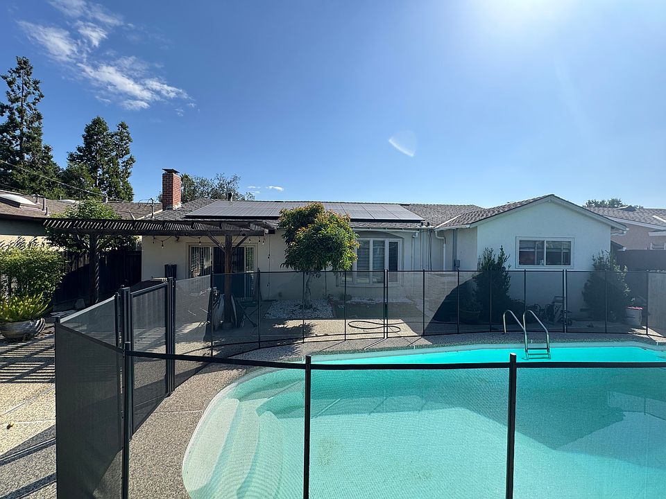 Backyard with solar panels on roof