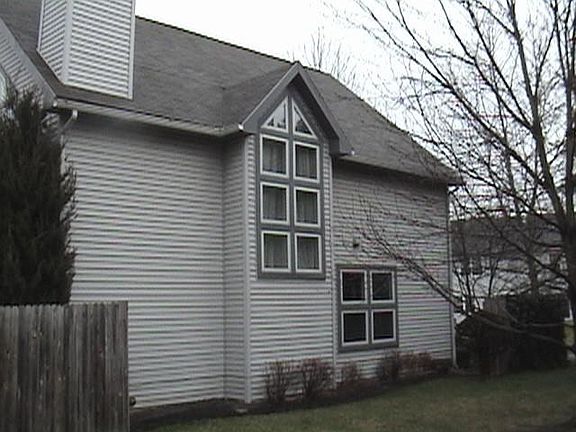 rear of house with fence back yard