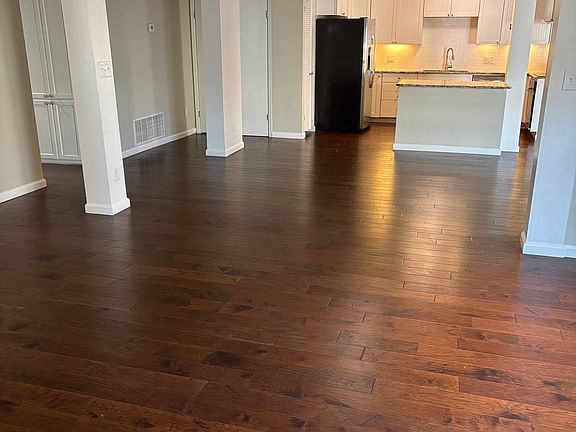 Living Area 1 view to Dining and Kitchen