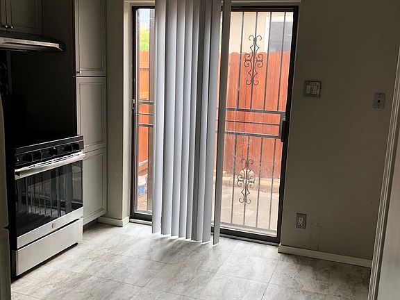 Pantry next to sliding door into pack patio.