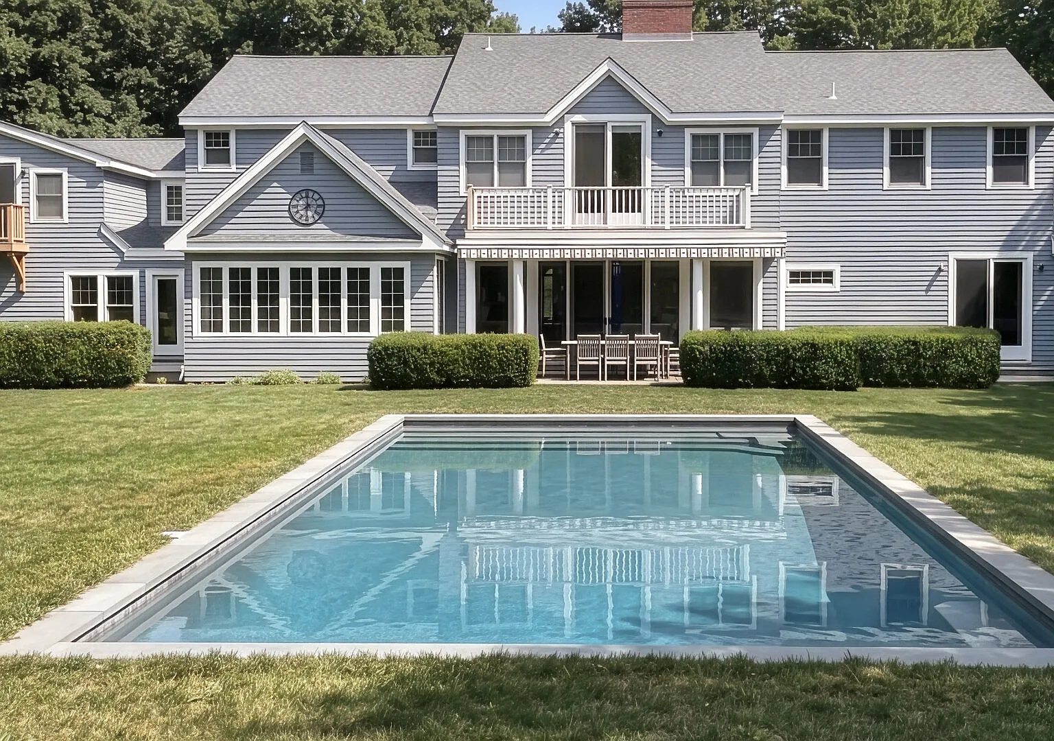 Traditional-style home with a private pool — Photo 1