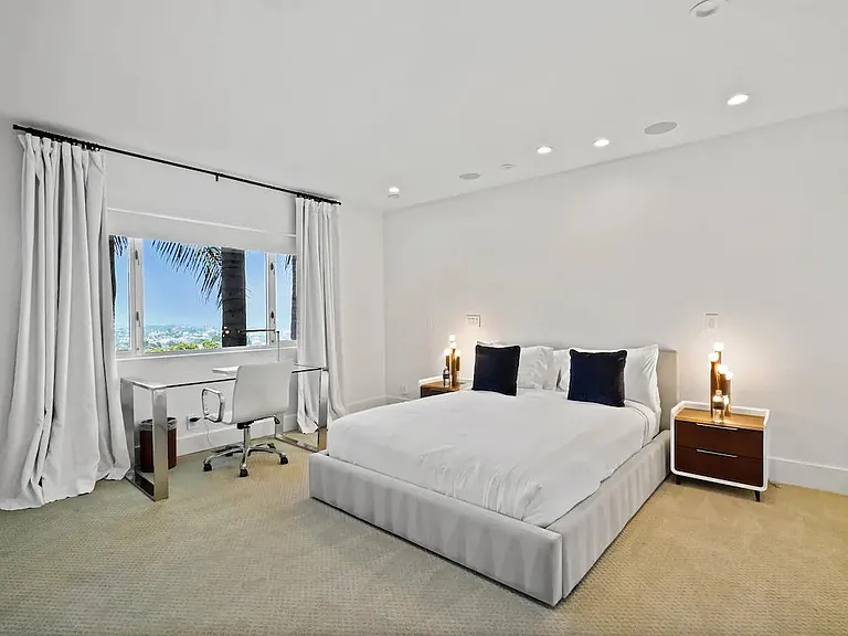 Utilize the convenient desk space in the bedroom for work or study, combining productivity with relaxation.