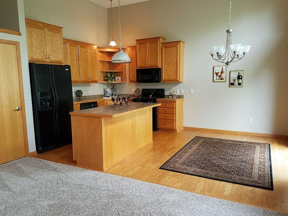 Large dining room attached with deck and sliding door.