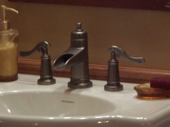 faucet detail in new bathroom