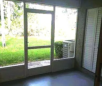 Enclosed Patio with large storage closet.