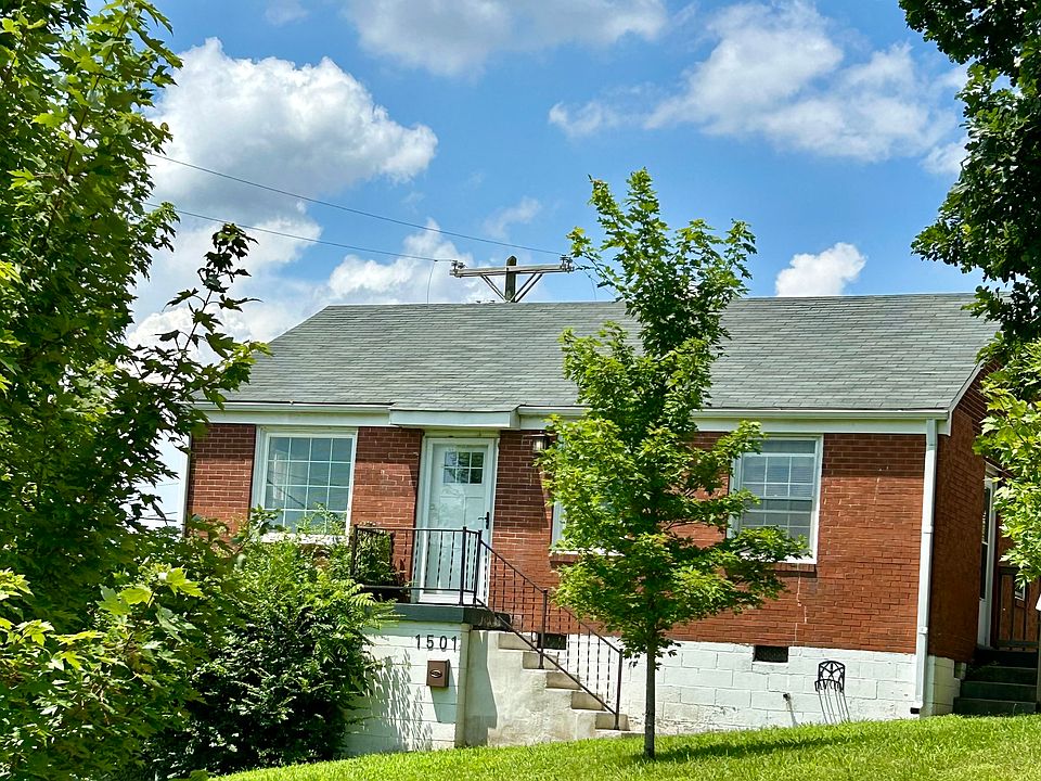 Charming brick cottage with tree filled yard. City views with country quiet.