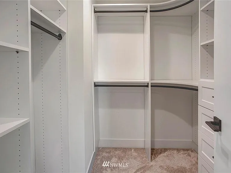 Master bedroom completely built walk-in closet
