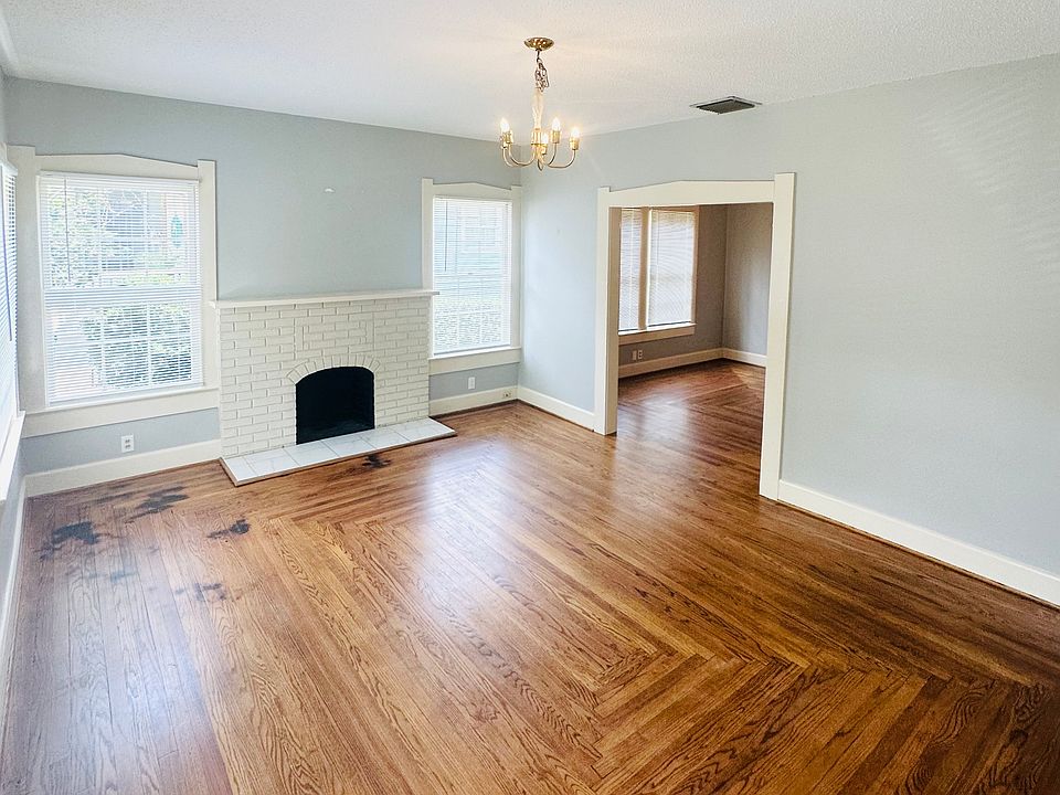 Entering through the front door (off of the front porch), you'll find the large living room (fireplace is not functional)