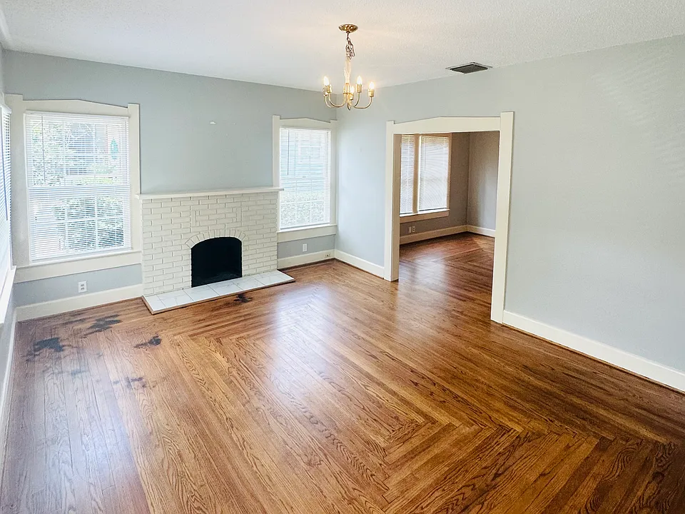 Entering through the front door (off of the front porch), you'll find the large living room (fireplace is not functional)