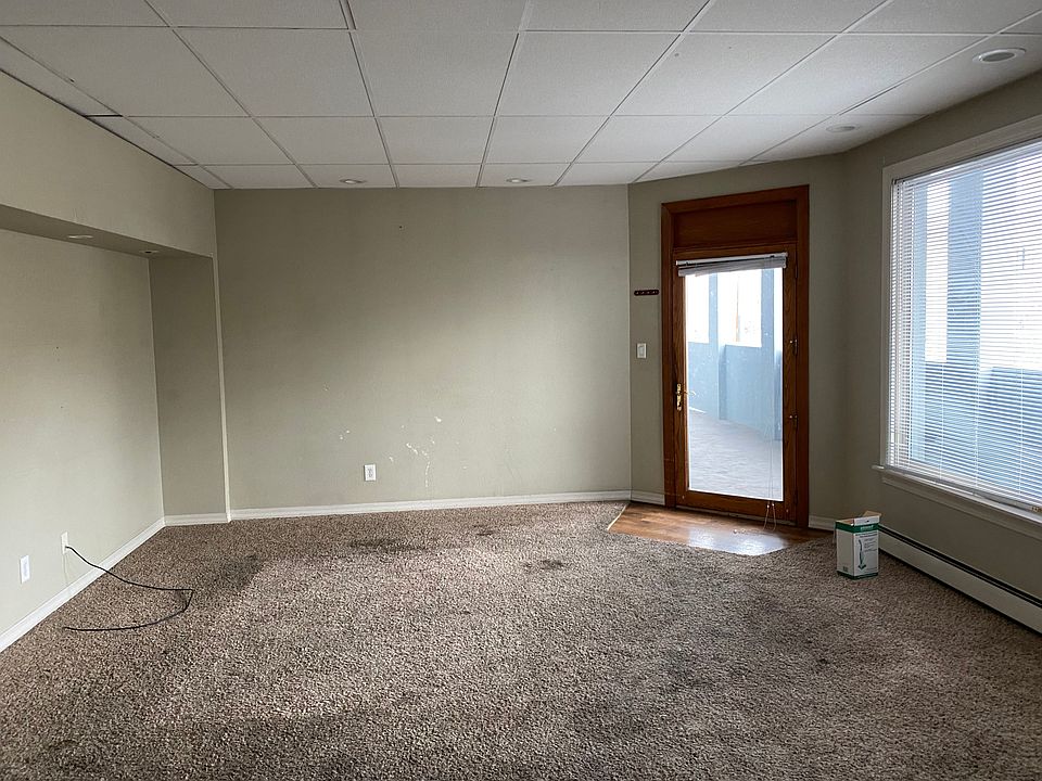 Bright, open living area. Property is downtown close to nightlife, shopping, bus line. Easy access to UM