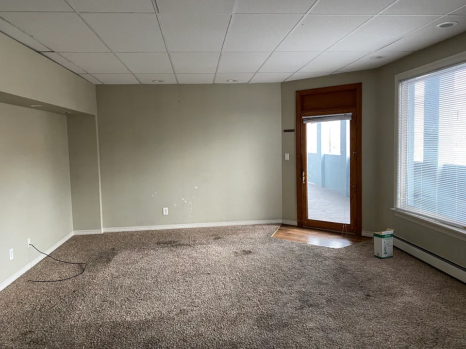 Bright, open living area. Property is downtown close to nightlife, shopping, bus line. Easy access to UM