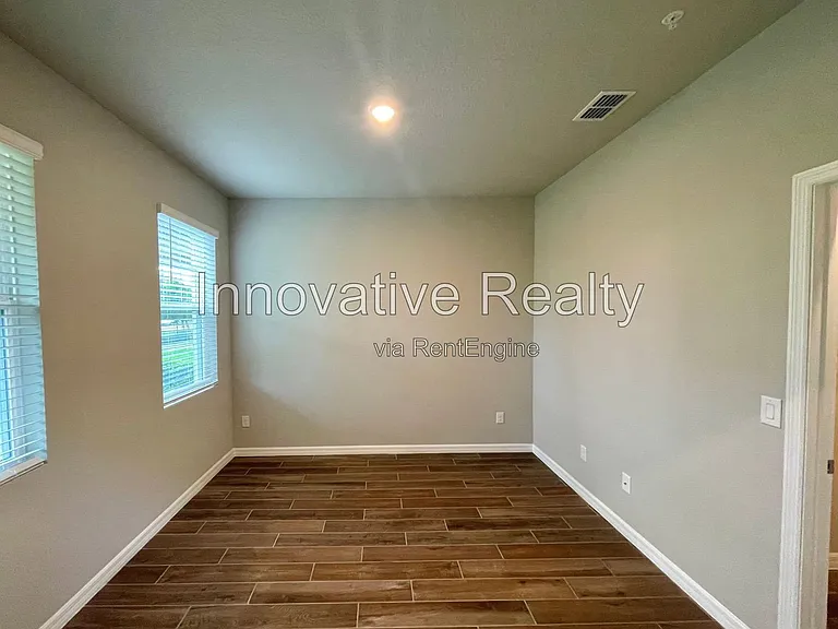 1016 Legacy Winds Way — Photo 8