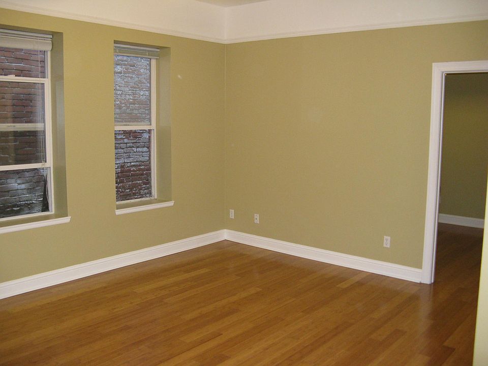 living room , door way to bedroom huge walk in closet