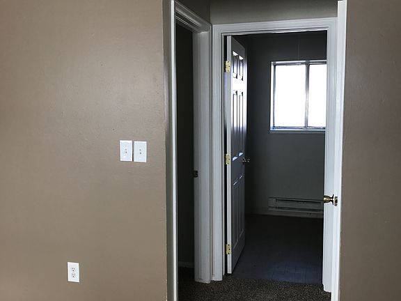 Lower level leading to BR and .5 bath plus laundry hook-up