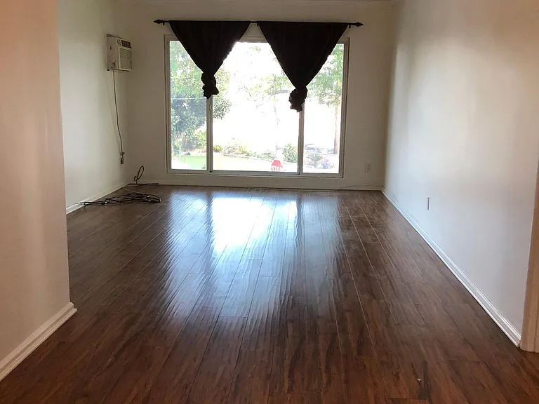 View Dining room to Living room and picture window