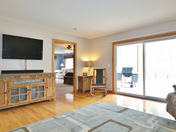 Allowing the home to extend to the outdoors is the large sliding glass door. In the summer throw open the slider and get ready for family and friends to enjoy a barbecue and casual conversation.