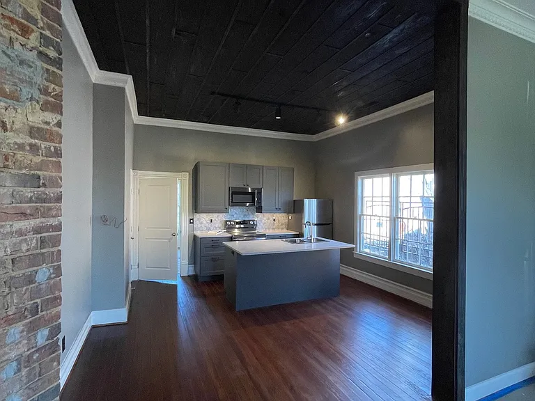 view of living to dining & kitchen.