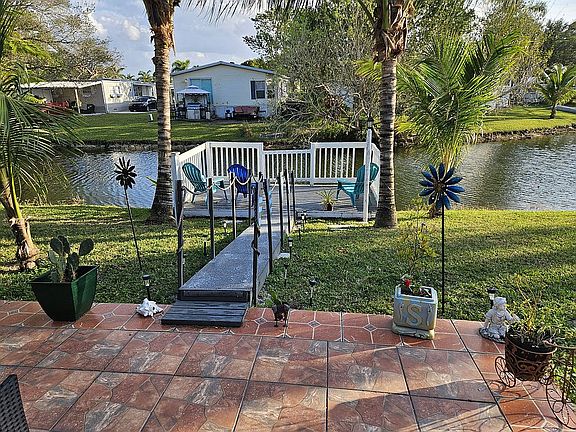 Backyard patio, dock & canal