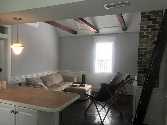 Open concept kitchen to family room with loft/ high ceilings