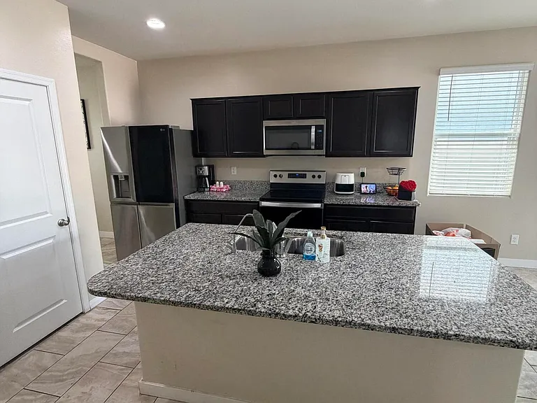 7836 W Riverside Ave — Photo 6