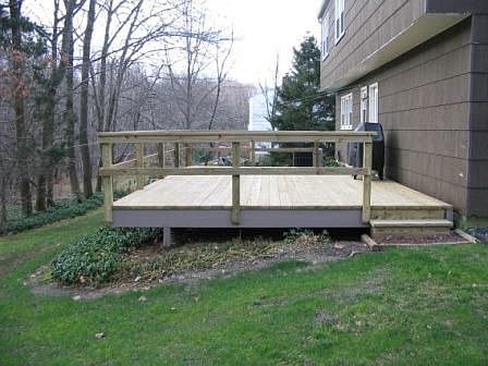 New deck overlooking your private wooded lot.