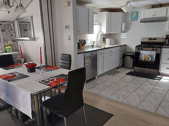 Kitchen leads to dining area