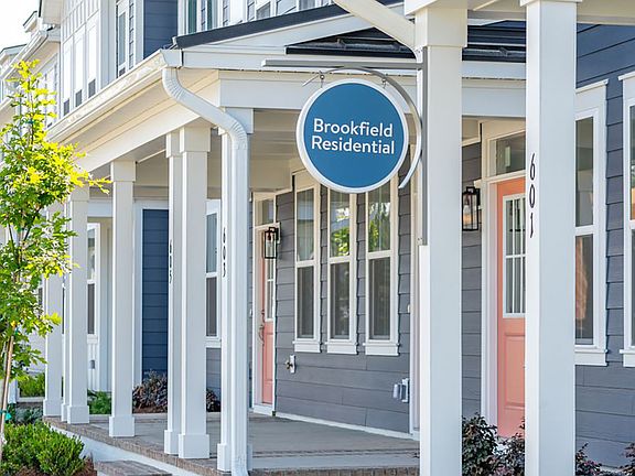 A view of front porches of the townhomes by Brookfield Residential at Nexton.
