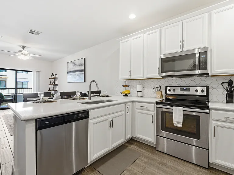Spacious kitchen featuring premium finishes and everything you need.